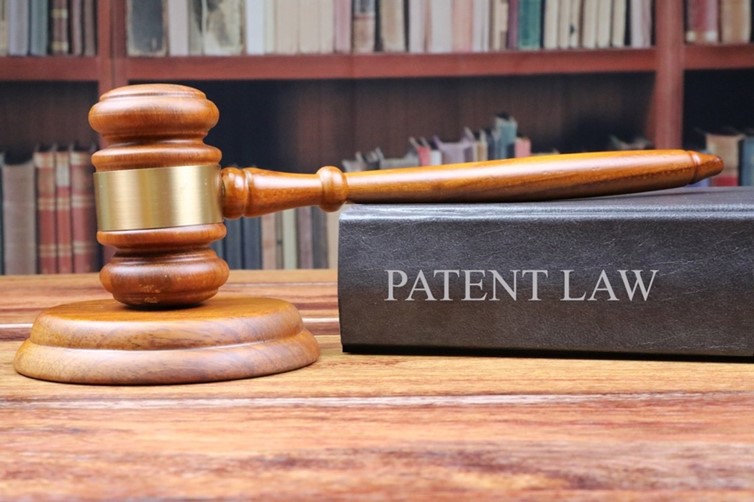 gavel and book with the title "patent law"